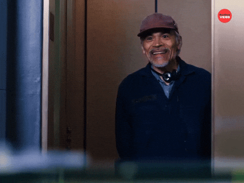 Man Laughs As Elevator Door Closes GIF