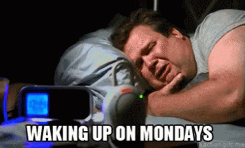 Man Laying In Bed Waking Up On Mondays GIF