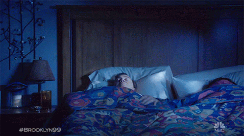 Man Laying in Bed With Blanket Saying #brooklyn99