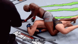 Man Laying on Another in UFC Match