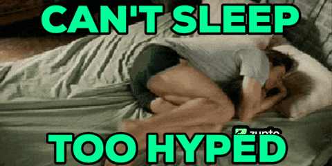 Man Laying on Bed Can't Sleep Too Hyped