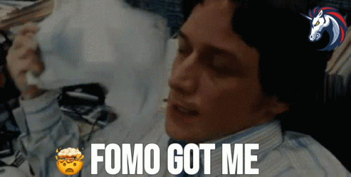 Man Laying on Bed Saying Fomo Got Me