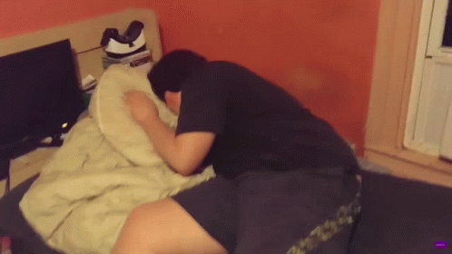 Man Laying on Bed With Netflix Pillow Sticker