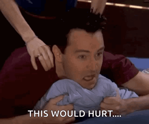 Man Laying on Bed Woman Holding Head Saying This Would Hurt