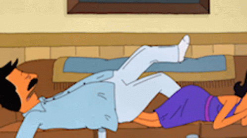 Man Laying on Floor Beside Woman in Purple Dress