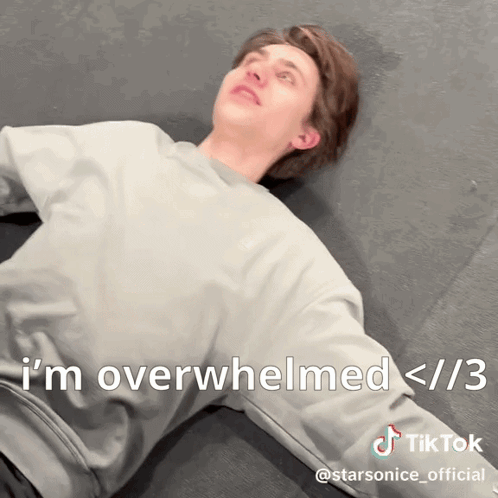 Man Laying on Floor Saying I'm Overwhelmed