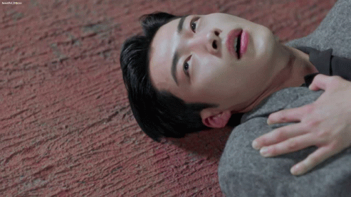 Man Laying On Floor With Hand On Chest Saying Beautiful GIF