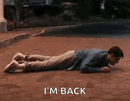 Man Laying on Ground Saying I'm Back