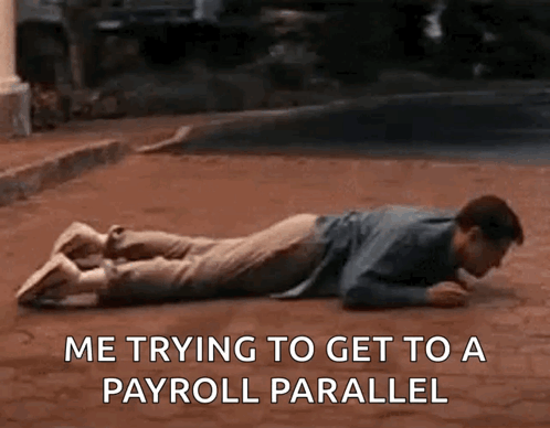Man Laying on Ground Saying Me Trying to Get to a Payroll Parallel