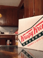 Man Licking Krispy Kreme GIF