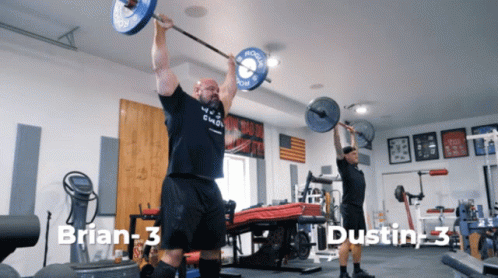Man Lifting Barbell in Gym Brian and Dustin