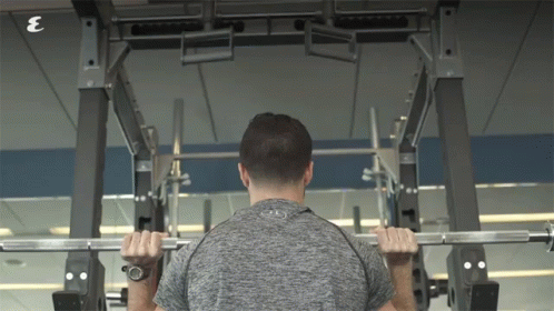 Man Lifting Barbell In Gym With Letter E GIF