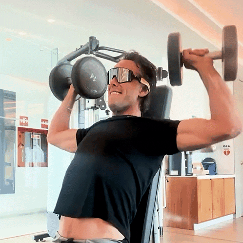 Man Lifting Dumbbell With Sign Dra