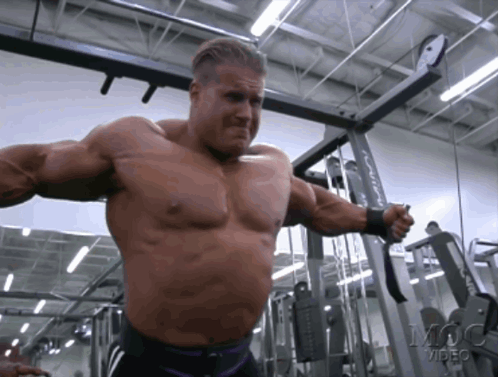 Man Lifting Weights in Gym