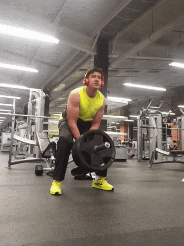Man Lifts Barbell Row While Listening To Music GIF