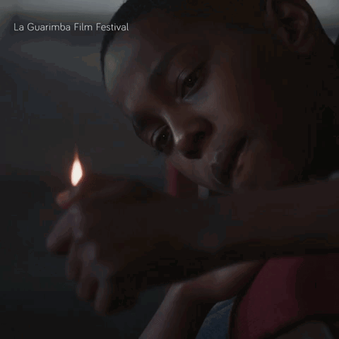 Man Lighting Candle La Guarimba Film Festival