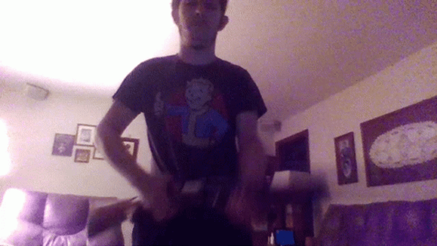 Man Loading Shotgun At Home GIF