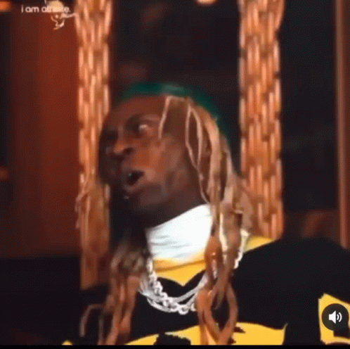 Man Long Blonde Hair Yellow Black Shirt Green Hat