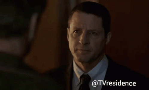 Man Looking At Another In Dark Room GIF