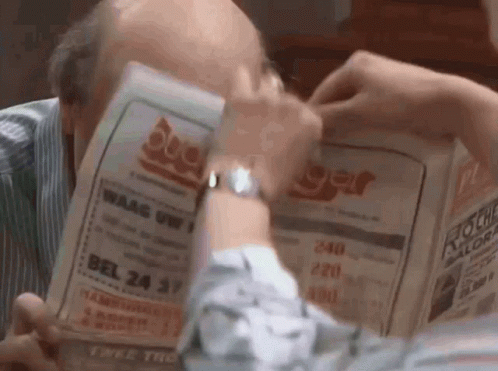 Man Looking At Burger Flyer GIF