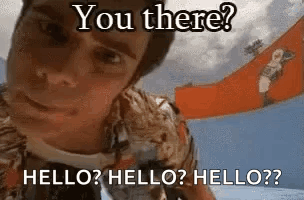 Man Looking at Camera Saying Hello