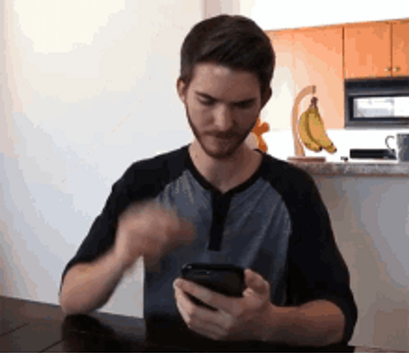 Man Looking At His Phone Head Scratch GIF