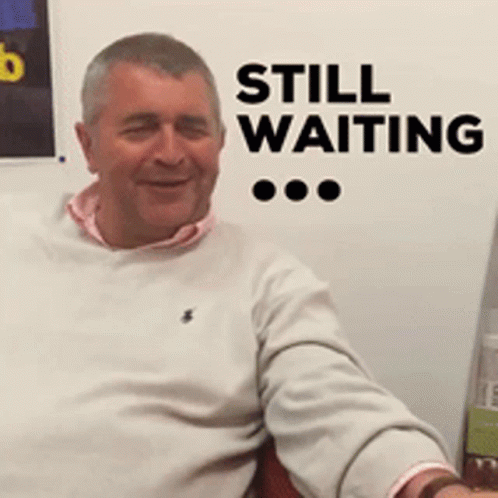 Man Looking At His Watch Still Waiting GIF