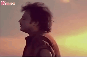 Man Looking at Sun at Sunset