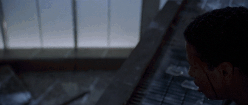 Man Looking In Dark Room With Window GIF