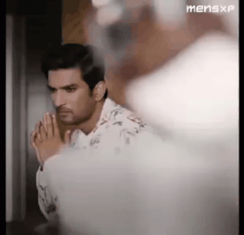 Man Looking in Mirror Praying