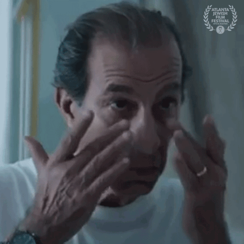 Man Looking in Mirror With Laurel Wreath Atlanta International Film Festival