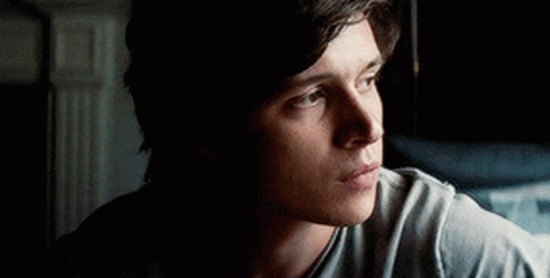 Man Looking Out Window GIF
