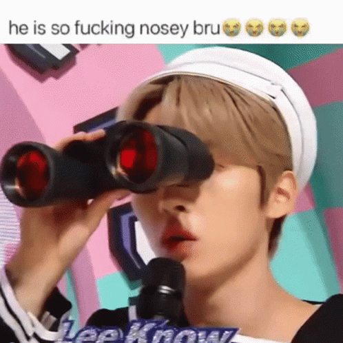 Man Looking Through Binoculars Pink Background