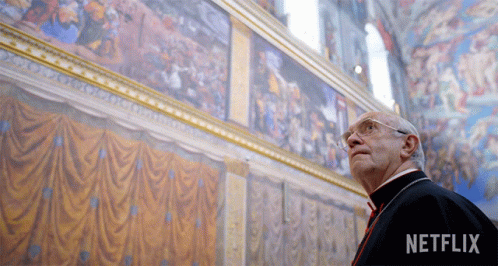 Man Looking Up at Painting With Netflix Logo