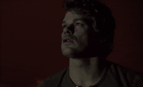 Man Looking Up at Sky at Night