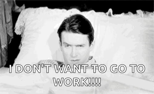 Man Lying in Bed Saying I Don't Want to Work