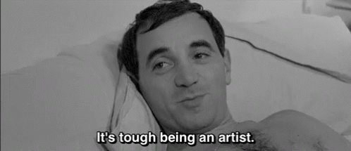 Man Lying in Bed With It's Tough Being an Artist