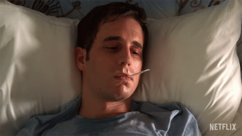 Man Lying In Bed With Thermometer Netflix GIF