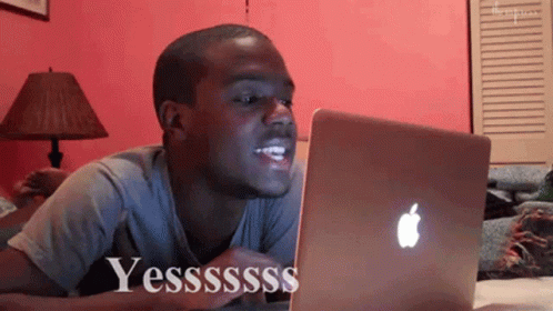 Man Lying In Front Of Apple Laptop Yesssss GIF