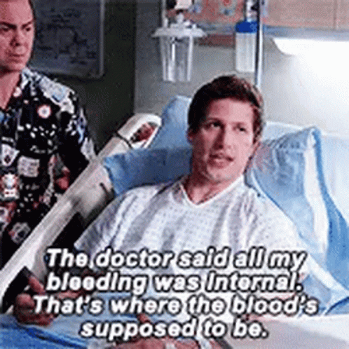 Man Lying in Hospital Bed