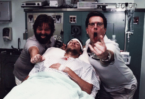 Man Lying In Hospital Bed Holding Tequila GIF