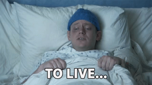 Man Lying in Hospital Bed Saying To Live