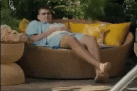 Man Lying On Couch With Book GIF