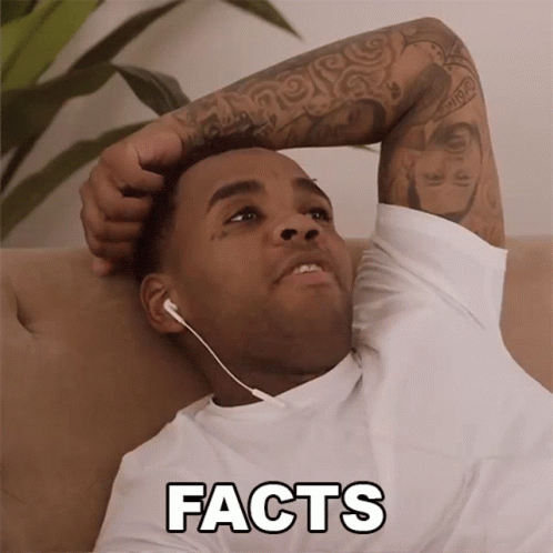Man Lying On Couch With Ear Buds Facts GIF