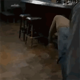 Man Lying on Floor in Room