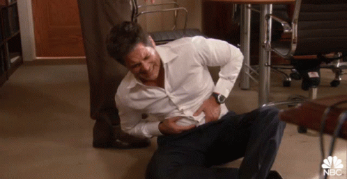 Man Lying On Floor With NBC Logo GIF