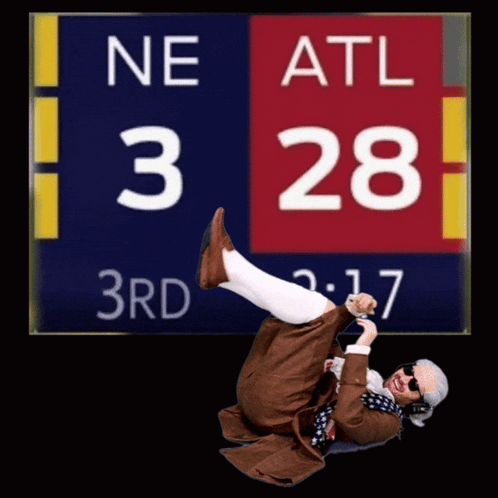 Man Lying on Ground by Scoreboard Ne Atl