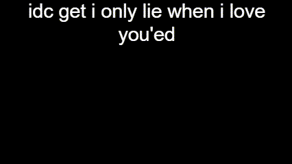 Man Lying on Ground Holding Guitar idc get i only lie when i love you 'ed