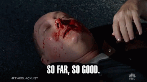 Man Lying on Ground With Blood