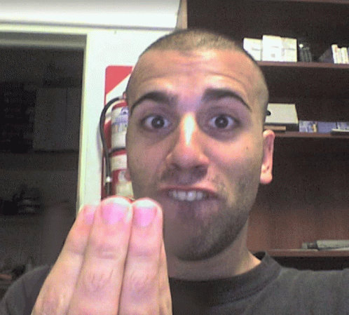 Man Making Funny Face At Extintor Fire Extinguisher GIF